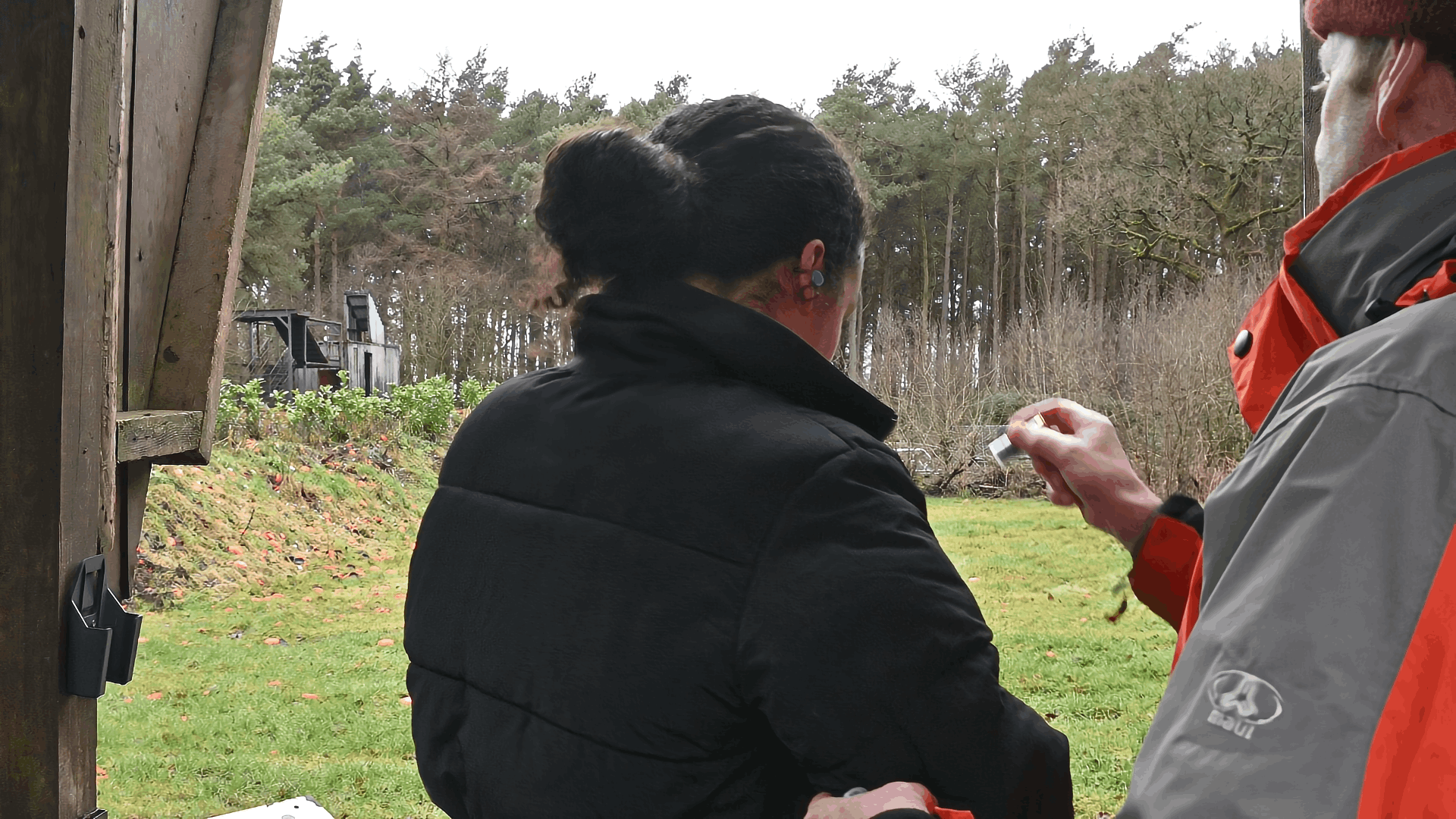 women getting shooting instruction on her first time clay pigeon shooting at Manchester clay pigeon club