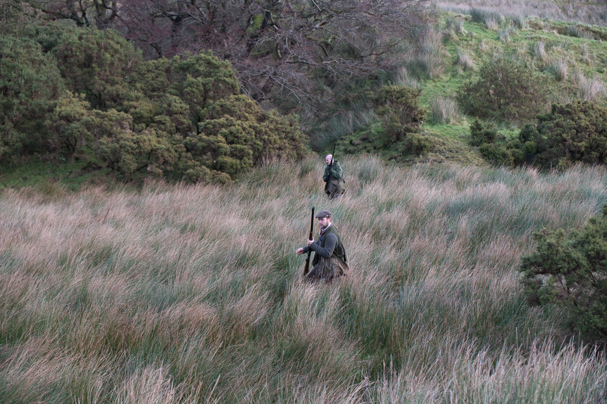 man enjoying a days rough shooting in tough conditions 